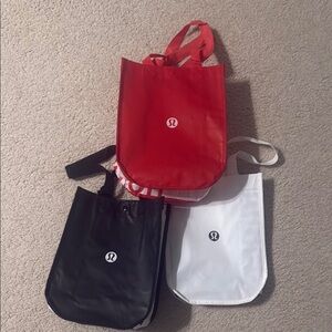 Lululemon Athletica Red, Black, and White Tote Bags